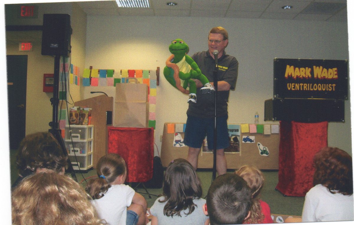 Mark Wade performing at a library